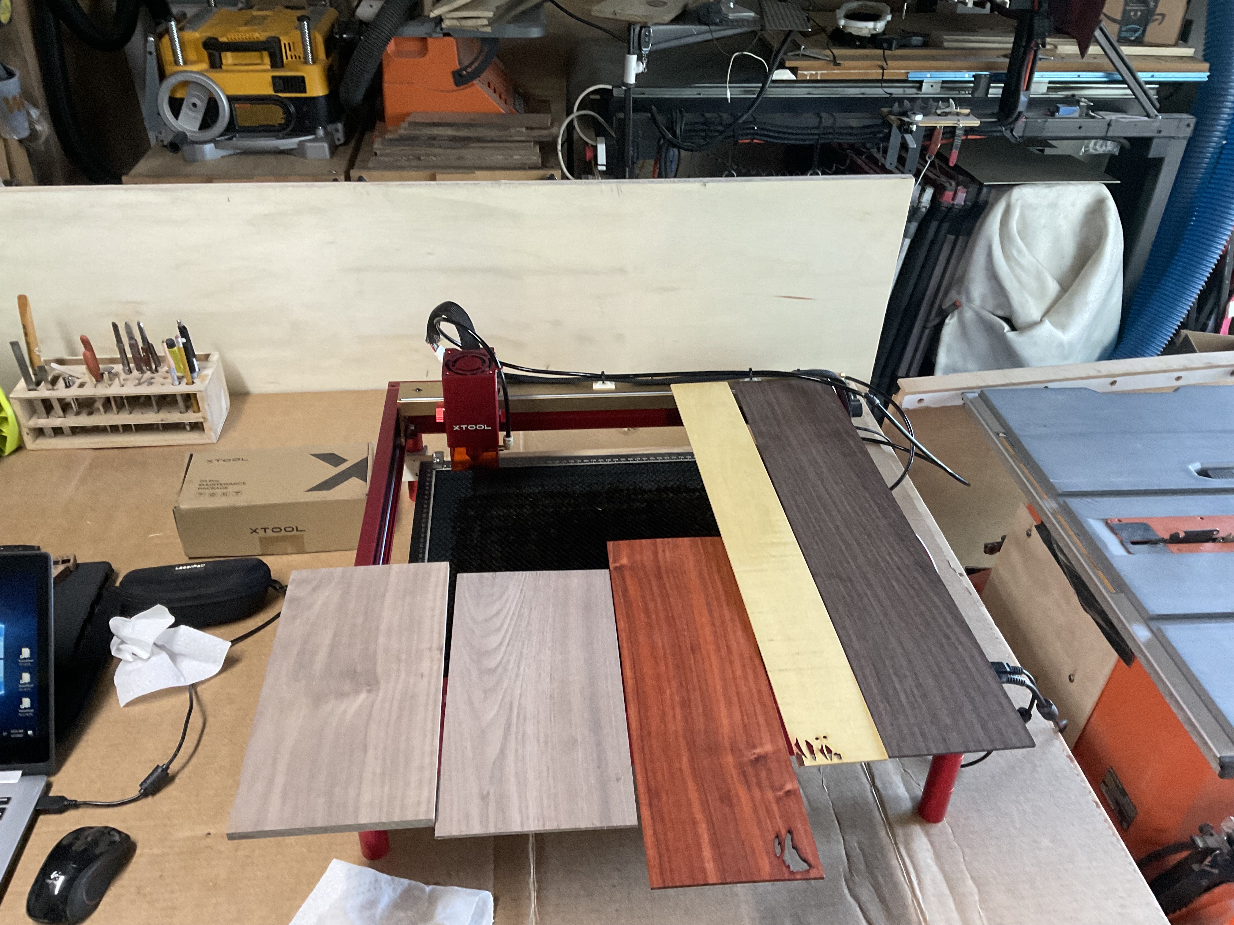 Thin hardwood pieces prepared for the butterfly inlay project